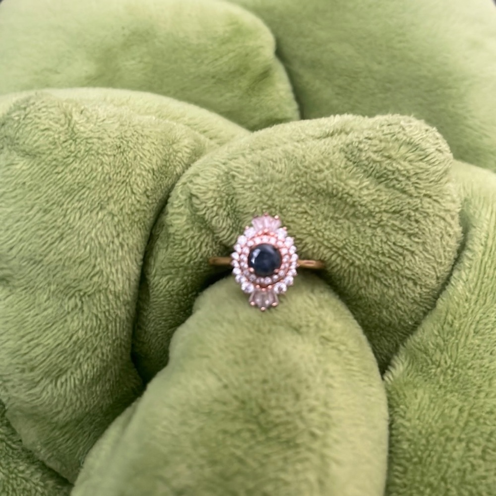 Rose gold with blue stone